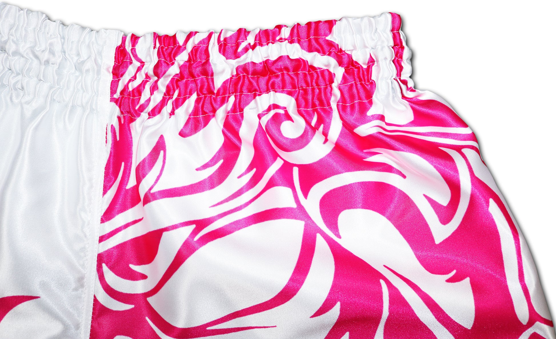 close-up picture of a white muay thai boxing shorts with a pink samurai design