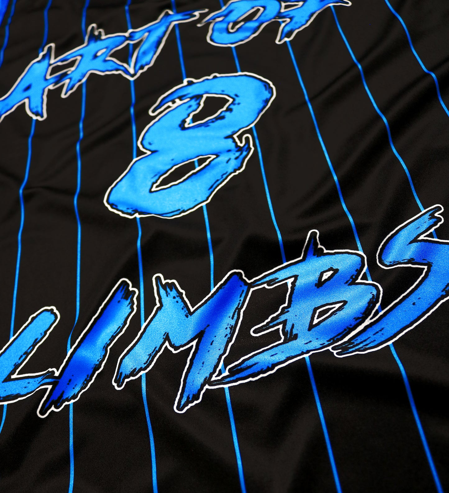 close-up form the backside of a black muay thai tank top with blue stripes and the letters art of 8 limbs