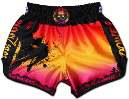 Tropical Sunset Muay Thai Boxing Shorts – vibrant orange, pink, and yellow design with silhouette artwork, handcrafted in Thailand for training and fights.